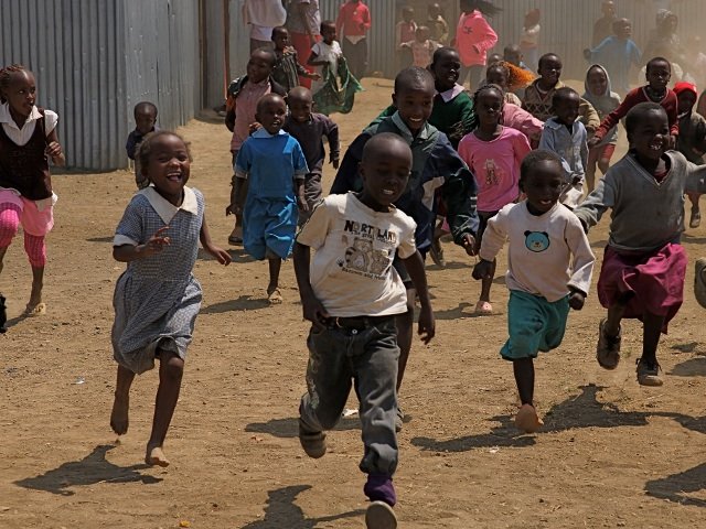 The children at the IDP camp in Maai Mahiu, Kenya learn how to play red light, green light (Credit: B Kulick)