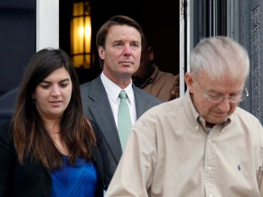 Former presidential candidate and U.S. Sen. John Edwards follows his daughter, Cate, and father, Wallace Edwards, out of a federal courthouse during his trial in Greensboro, N.C., Monday, May 14, 2012 (Credit: AP/Bob Leverone)