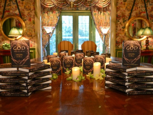 A book display of Mark Burnett and Roma Downey's new book, A Story of God and All of Us: A Novel Based on the Epic TV Mini-Series, at a preview event in Dallas (Credit: James Edward)