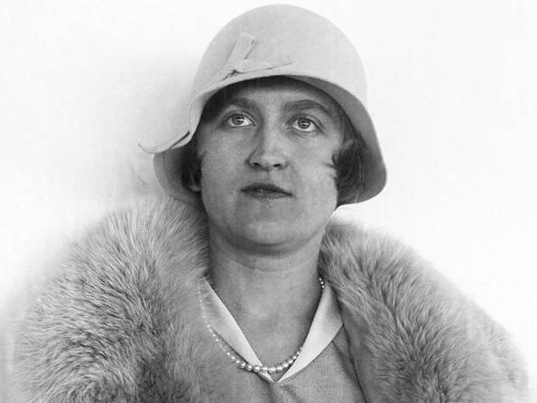 Huguette Clark poses for a photo in a fur coat, a stylish hat, and pearls, in the last known photo, taken in 1930 before she became a recluse (Credit: Associate Press)