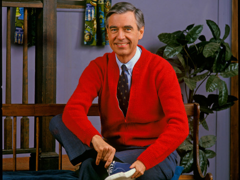 Mr. Rogers changing his shoes at the start of his famous PBS show, Mr. Rogers Neighborhood (Credit: PBS)