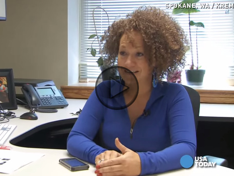 Rachel Dolezal speaks with a reporter in her office during an interview about her racial identity (Credit: USA Today via Youtube)