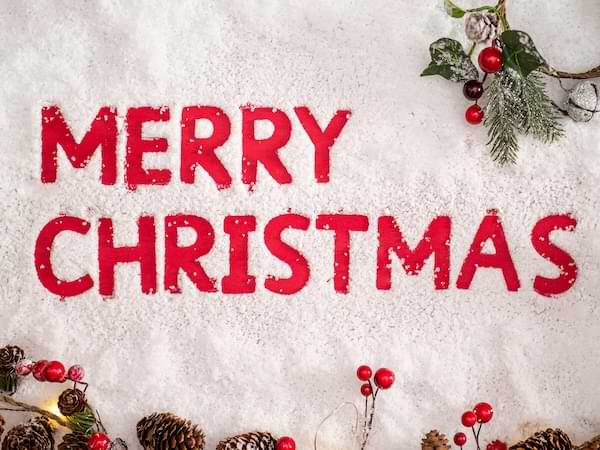 https://unsplash.com/photos/red-merry-christmas-text-overlay