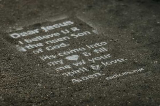 A grey marble stone with the salvation prayer etched in it. From the group radical.net, an organization that makes Jesus known among the nations.